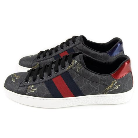 gucci sneakers tiger fake|gucci tiger sneakers black.